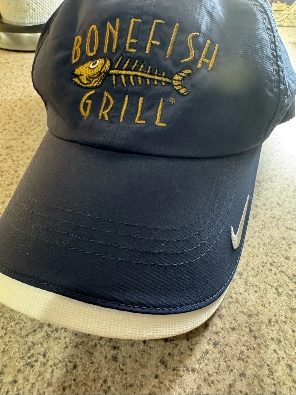 Nike GOLF Bonefish Grill dark blue baseball Hat cap with White Swoosh - NWT!!